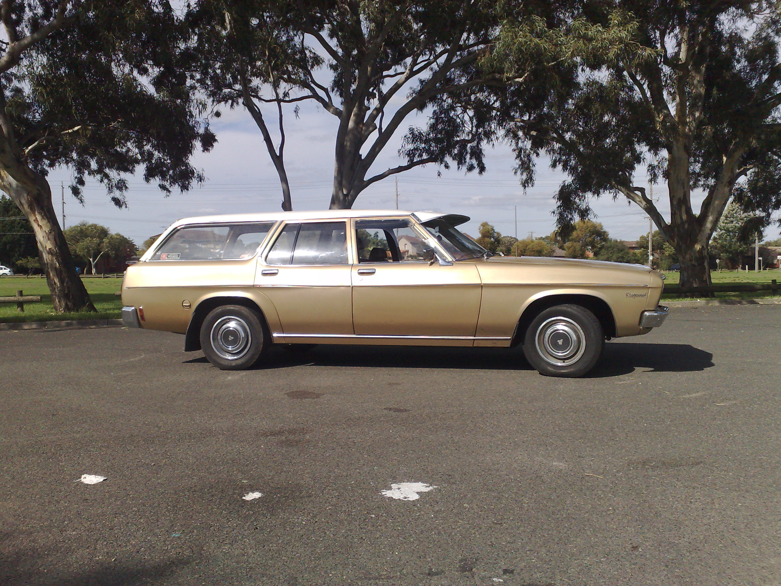 HQ Holden in Glacier White over Champagne Mk2 Met — Kingswood Station Sedan