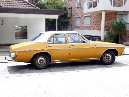 HQ Holden in Glacier White over Mustard — Kingswood Sedan