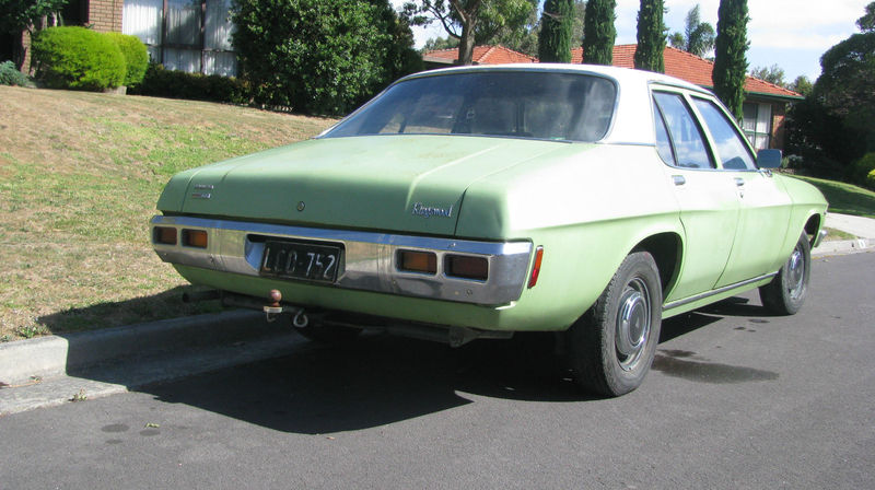 HQ Holden in Glacier White over Olive Green — Kingswood Sedan