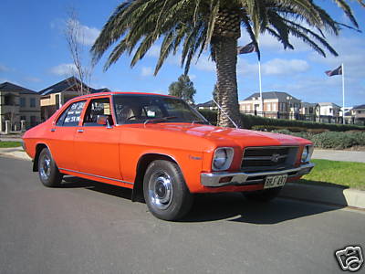 HQ Holden in Tangerine — Kingswood Sedan