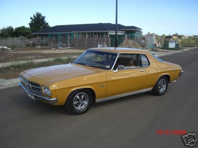 HQ Holden in Autumn Gold — LS Monaro Coupe