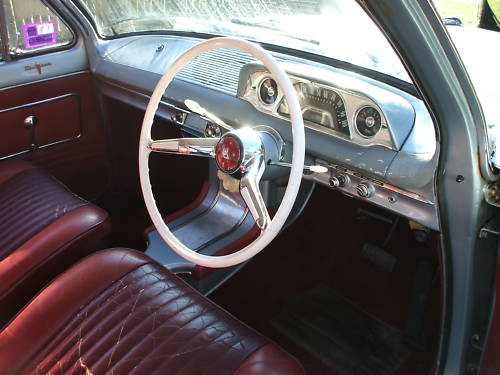 EJ Holden with Astoria & Waldorf Red trim — Premier Sedan