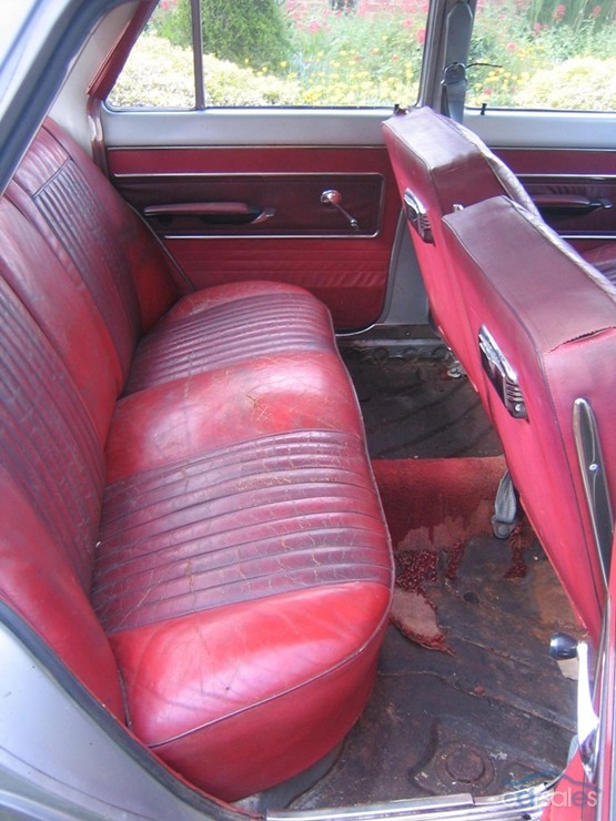 EJ Holden with Astoria & Waldorf Red trim — Premier Sedan