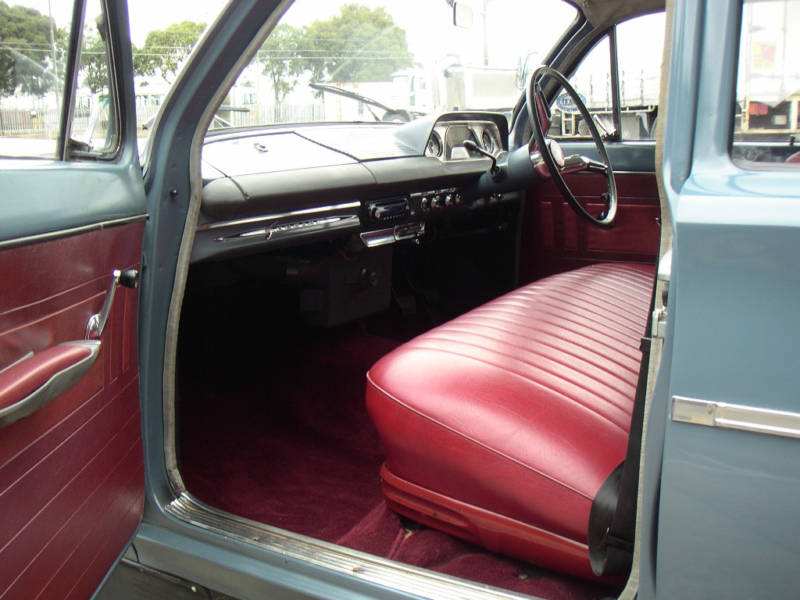 EH Holden with Garnet & Bolero Red trim — Special Sedan