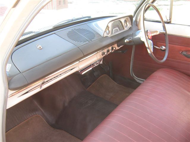 EH Holden with Garnet & Bolero Red trim — Special Sedan