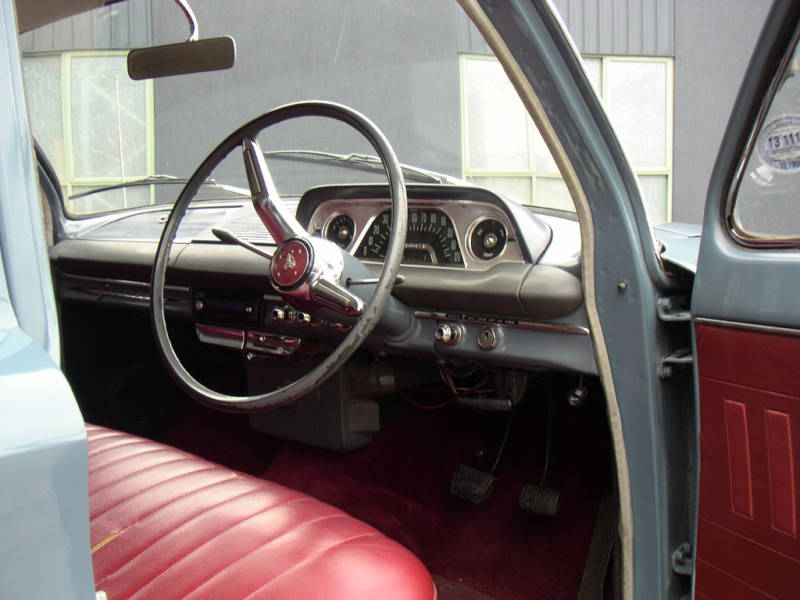 EH Holden with Garnet & Bolero Red trim — Special Sedan
