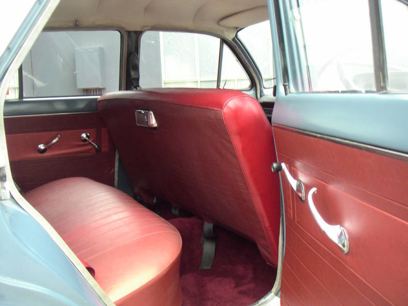 EH Holden with Garnet & Bolero Red trim — Special Sedan