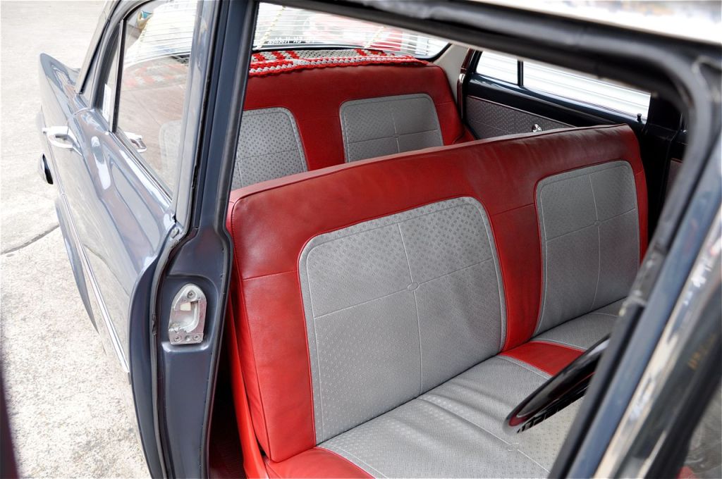 EK Holden with Grenadier Red & Athens Grey trim — Special Sedan