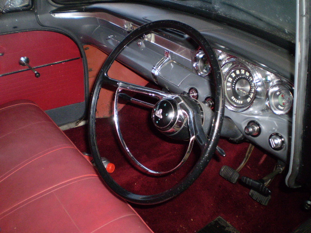 EK Holden with Grenadier Red trim — Special Sedan