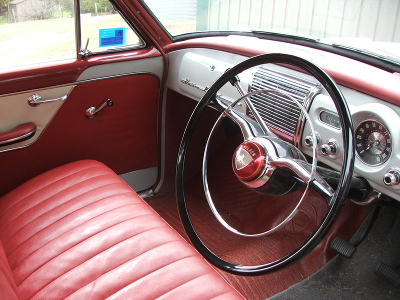 FE Holden with Fall Red & Parchment Ivory trim — Special Sedan