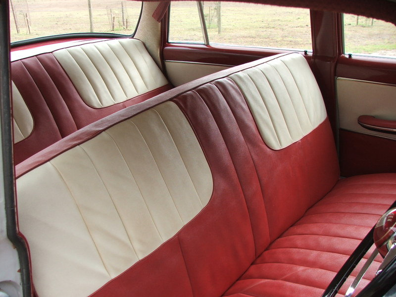 FE Holden with Fall Red & Parchment Ivory trim — Special Sedan