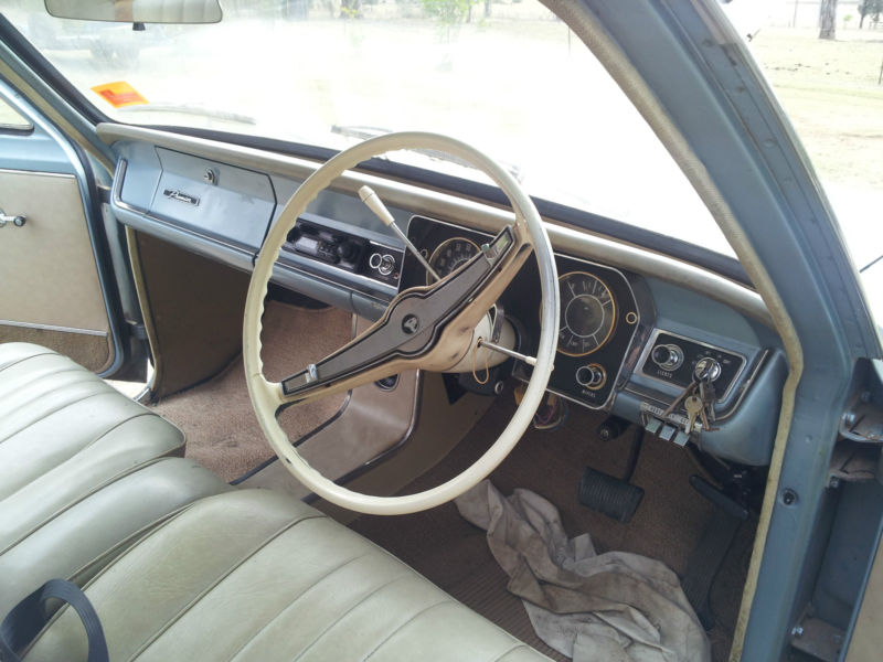 HD Holden with Bone trim — Premier Sedan