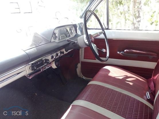 EJ Holden with Garnet & Bolero Red with Feathertop Grey trim — Special Station Sedan